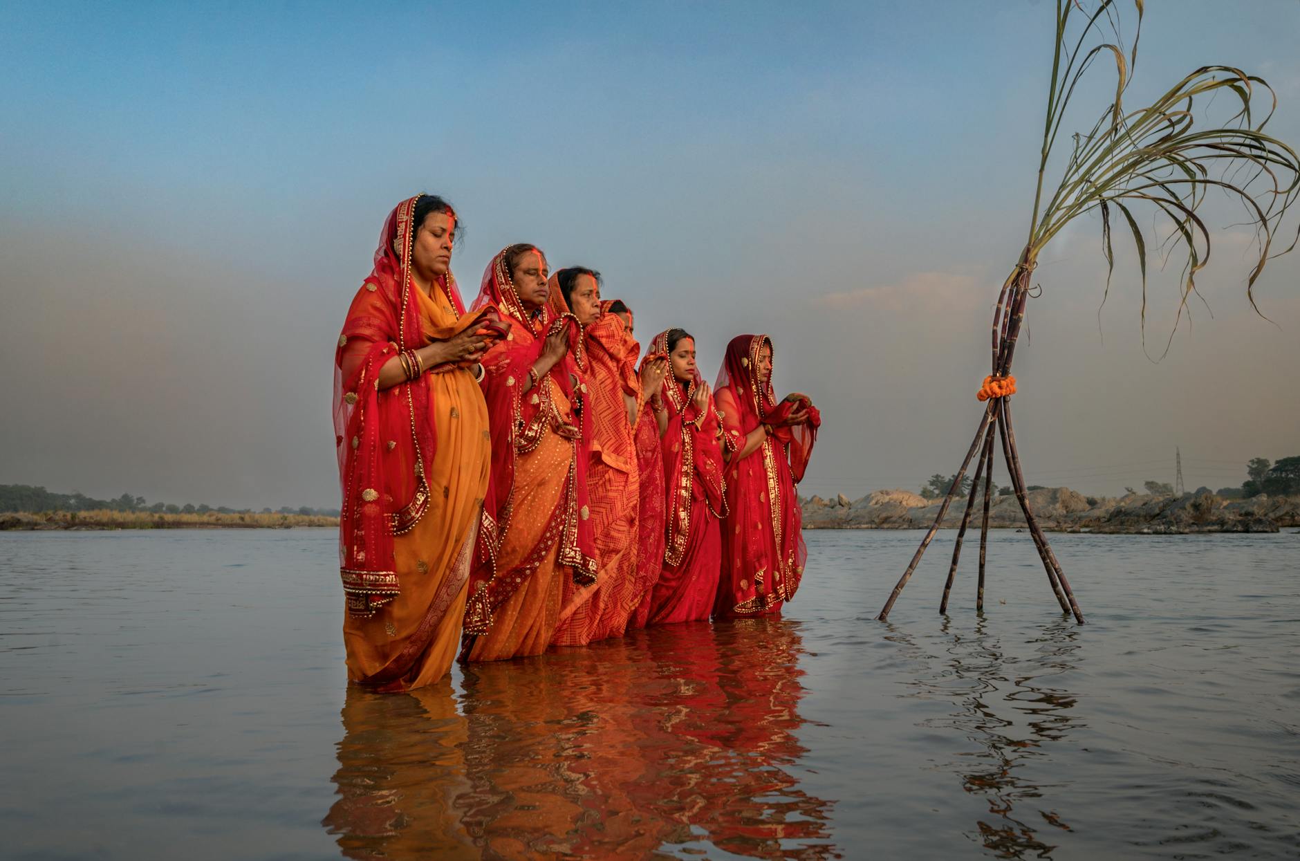 women having ritual in ganges